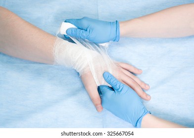 Nurse Bandages Hands