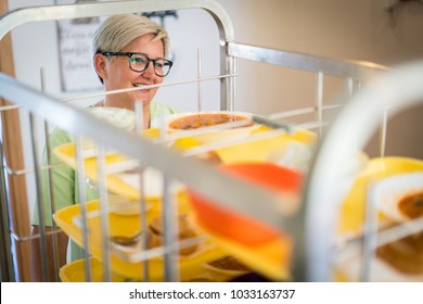 Nurse Bringing Food Service