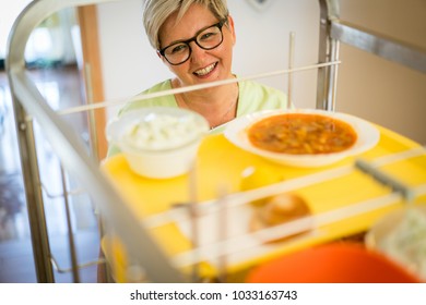 Nurse Bringing Food Service