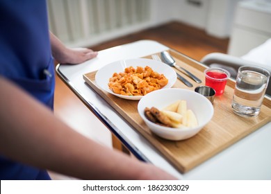 Nurse Bringing In A Hospital Food