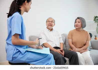 nurse or caregiver meeting and talking with about health with senior couple   - Powered by Shutterstock