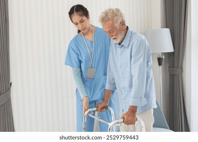 Nurse caregiver support helping senior man walking with walker. Exercise for physical therapy after sickness. Therapist take care of grandfather in nursing home. healthcare and medical insurance - Powered by Shutterstock