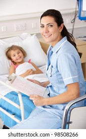 Nurse With Child Patient In UK Accident And Emergency