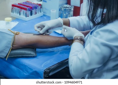 The nurse collected blood samples from patients for analysis and check whether the infection is coronavirus (covid-19) virus or not.