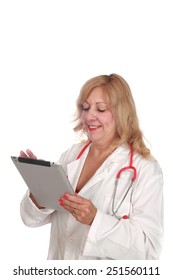 A Nurse Or Doctor Uses A Computer Tablet To Take Notes, Write Prescriptions, Check Patients Charts, Write And Read Emails, Play Solitaire, And Chat With Friends On Line Around The World. On White