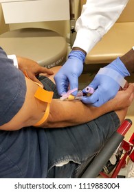 Nurse Drawing Blood In Hospital 