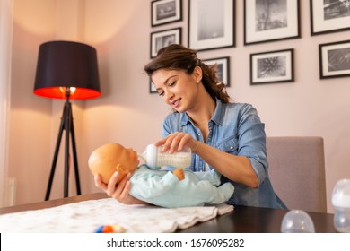 Nurse Filming Tutorial About Newborn Baby Bottle Feeding And Baby Handling As Part Of Online Prenatal Classes Course