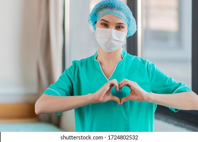 Nurse with hands heart shape  - Shutterstock ID 1724802532