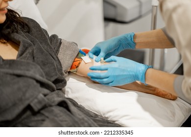 Nurse Inserting Catheter Into Patient's Vein During A Blood Purification Procedure, Close-up