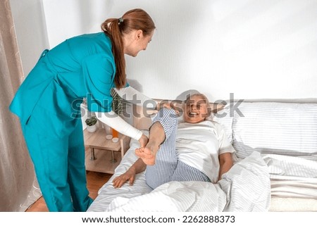 Similar – Female doctor filling questionnaire to senior patient