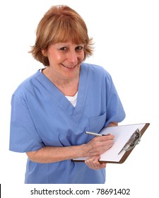 Nurse Looking Up With Clipboard In Hand