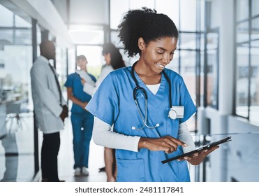 Nurse, medical and black woman with tablet in hospital healthcare, Telehealth or research for diagnosis prescription. Smile, female doctor and digital, online consultation or review surgery schedule - Powered by Shutterstock