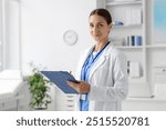 Nurse in medical uniform with clipboard indoors