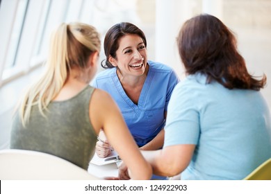 Nurse Meeting With Teenage Girl And Mother In Hospital - Shutterstock ID 124922903