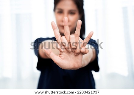 Nurse posing correct CPR hand in emergency first aid class room.