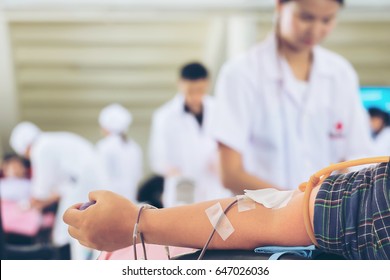 Nurse Preparing To Get Blood From Donors At Blood Donations Center, Selective Focus On Man's Forearm