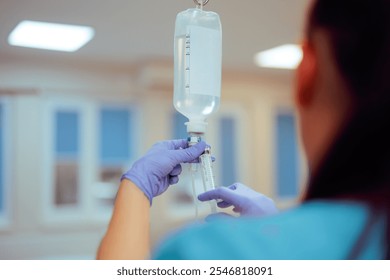 
Nurse Preparing Iv Bag Injecting Medication in a Hospital. Professional healthcare worker supervising intravenous therapy
 - Powered by Shutterstock