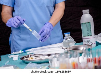 Nurse Preparing Medication For Parenteral Nutrition In A Hospital, Conceptual Image