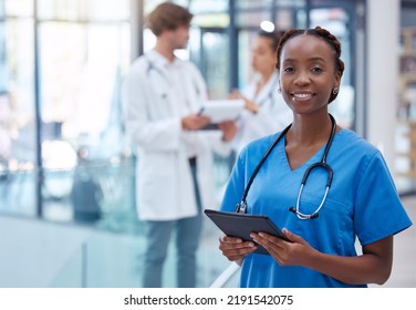 Nurse, professional and healthcare worker with tablet in medical center, clinic and hospital while analyzing test result. Portrait of frontline worker showing trust, care and knowledge about - Powered by Shutterstock