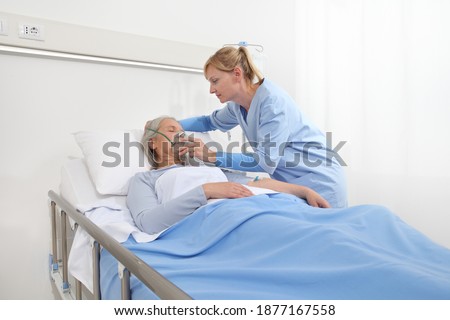 Similar – Female doctor filling questionnaire to senior patient