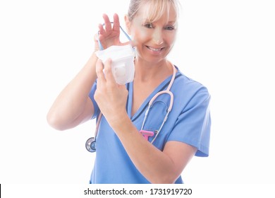 Nurse Putting On A Respirator P2 N95 Respirator Mask