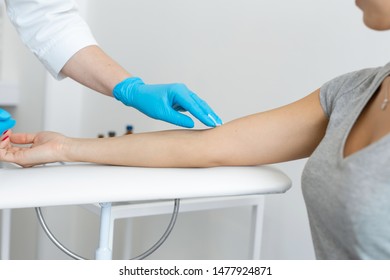 The Nurse Rubs The Hand With Alcohol Before Taking Blood From A Vein For Testing. Disinfects The Place Of Introduction Of A Needle With Antiseptic.