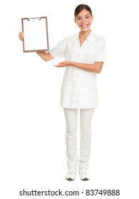 Nurse Showing Blank Clipboard Sign - A Medical Concept. Woman Doctor / Nurse Smiling Happy Isolated On White Background In Full Body. Mixed Race Caucasian / Chinese Asian Female Model.