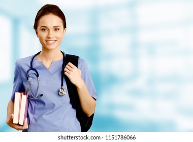Nurse student with books and stethoscope