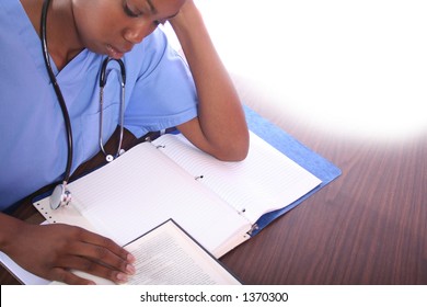 Nurse or Student Studying African American Woman
