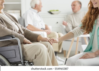 Nurse supporting the charge at nursing home