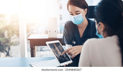 Nurse, tablet or patient with spine x ray for consultation, results or exam at hospital. Woman, doctor or face mask with technology, client or screen of MRI or ct scan for medical diagnosis at clinic - Powered by Shutterstock