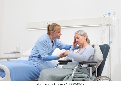 nurse take comfort sad and pensive elderly woman isolated on wheelchair near bed in hospital room, concept of loneliness and old age diseases