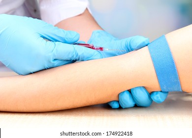 Nurse Taking A Blood Sample, Close Up