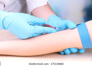 Nurse Taking A Blood Sample, Close Up