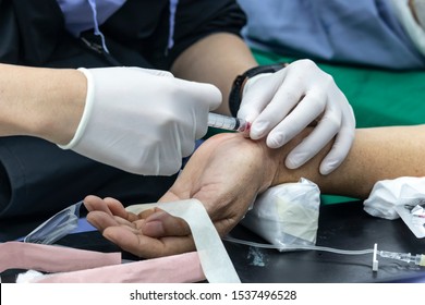 Nurse Taking Blood Sample From Patient In The Operating Room. Blood Drawing Sample For Blood Test The Health.