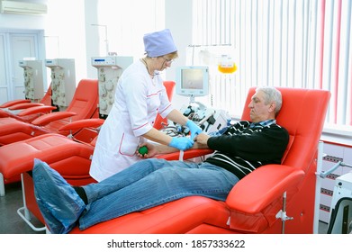 Nurse Taking Blood Sample From The Vain Of The Donor. The City (municipal) Blood Transfusion Station. April 5, 2019. Kiev, Ukraine