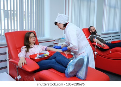 Nurse Taking Blood Sample From The Vain Of The Donor. The City (municipal) Blood Transfusion Station. April 5, 2019. Kiev, Ukraine