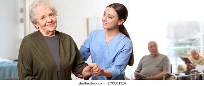 Nurse Taking Care Of Elderly Woman In Geriatric Hospice. Banner Design