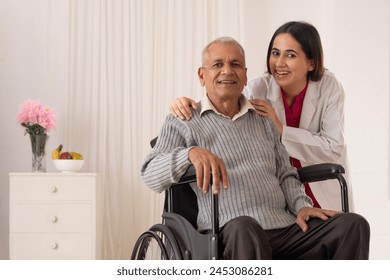 Nurse taking care of the senior patient sitting on wheel chair - Powered by Shutterstock