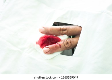 Nurse Taking Care And Suturing  The Wound On The Finger At Public Health Center