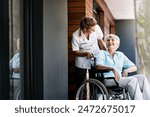 Nurse, talking and senior woman on wheelchair for support or rehabilitation of medical healthcare patient. Happy caregiver, retirement or person with disability at home for recovery, wellness or help