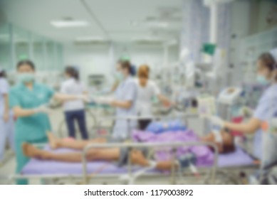 Nurse And Team Nursing Care To Treatment Patient In Emergency Room Blurred.