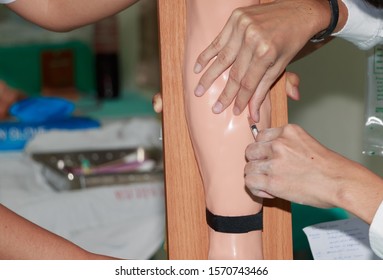Nurse  Training Injection With Arm Model For Education At Hospital Or School Of Nursing