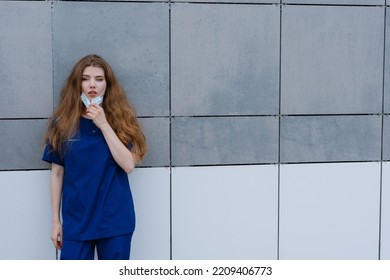 The Nurse Went Outside To Get Some Air Near The Clinic. A Difficult Work Shift In A Pandemic.