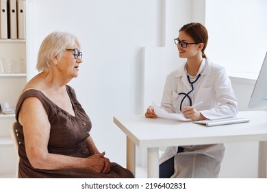 Nurse In White Coat Patient Examination Hospital Office