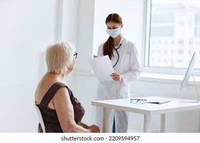 Nurse In White Coat Patient Examination Health Care