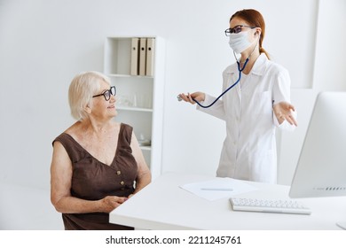 Nurse In White Coat Patient Examination Health Care