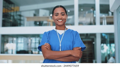 Nurse, woman and arms crossed with portrait, smile and pride for career in healthcare at hospital. Doctor, medical worker or person with confidence for wellness in clinic lobby with trust and support - Powered by Shutterstock