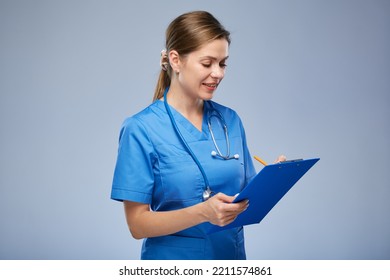 Nurse Woman Writing On Clipboard. Isolated Portrait.