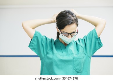 Nurse Working Putting Her Medical Mask. Medical Concept